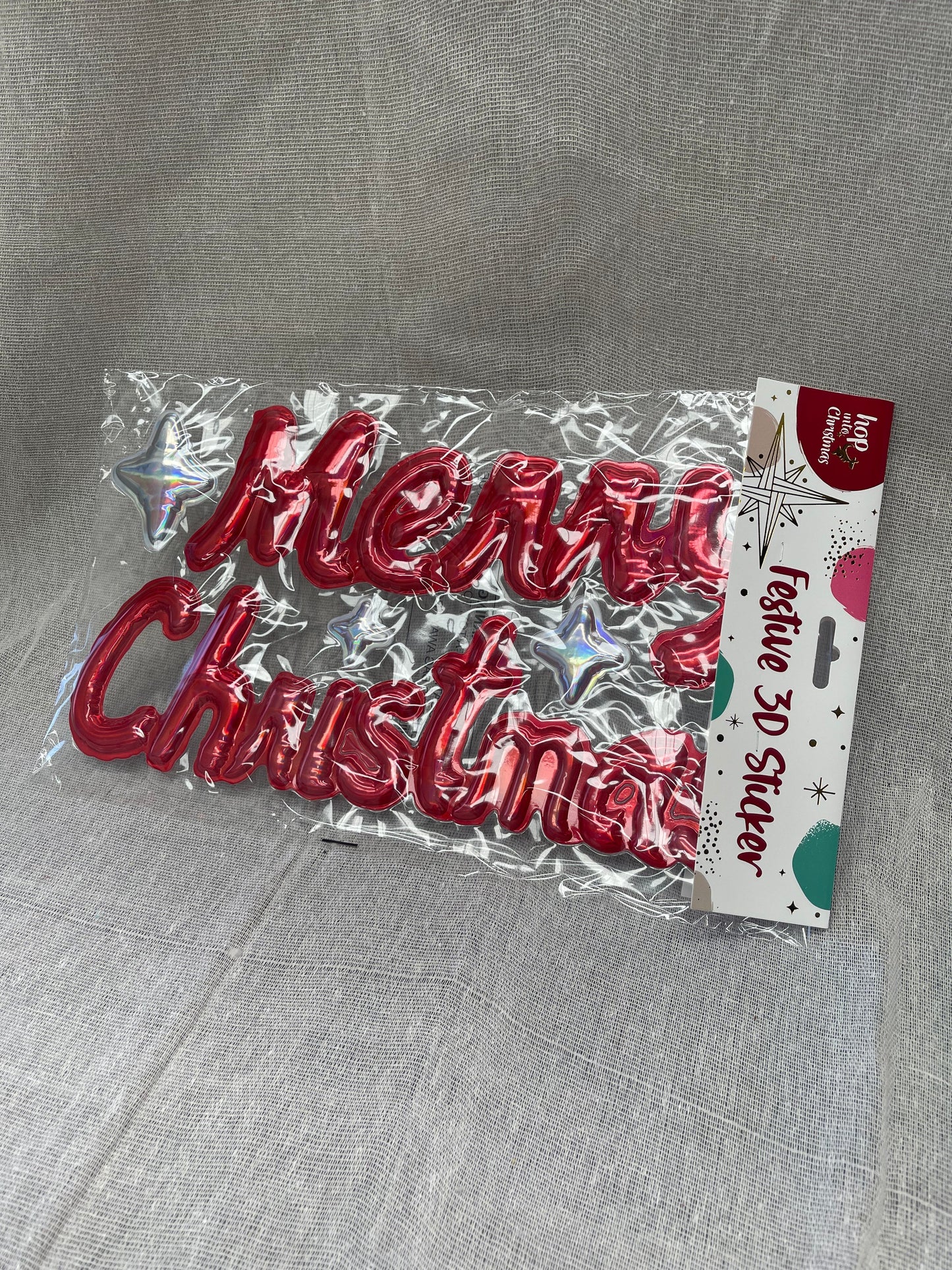 HOP INTO CHRISTMAS 3D Holographic Festive Window Sticker - Merry Christmas (Metallic Red) Lettering and Stars (Silver Metallic)